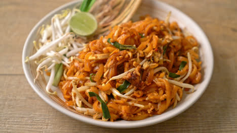 stir-fried noodle with tofu and sprouts or pad thai - asian food style