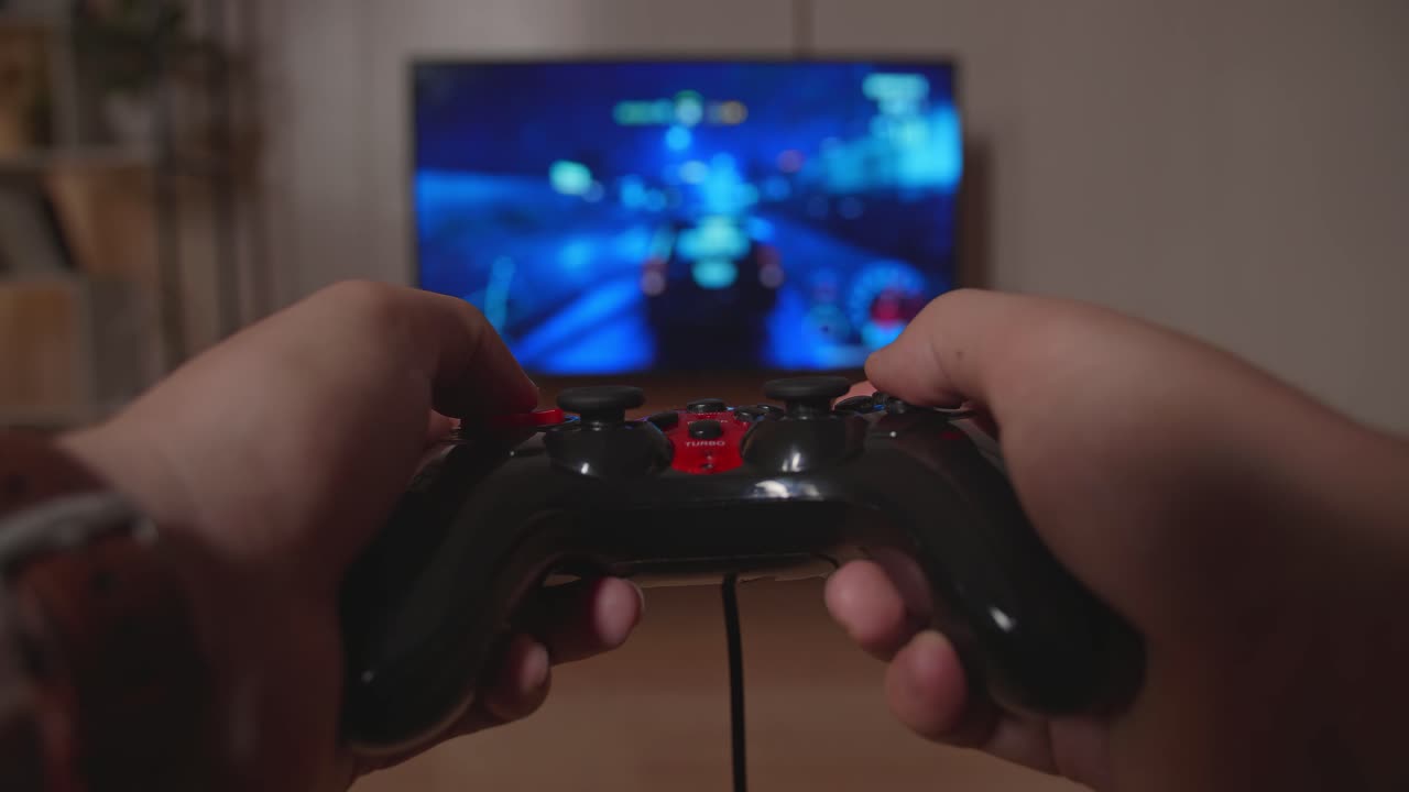Hands Gamer Playing Car Race Game On Tv