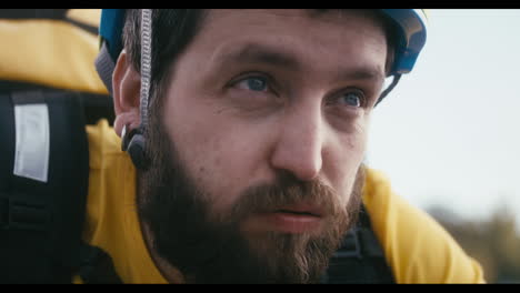 Man with Backpack and Helmet