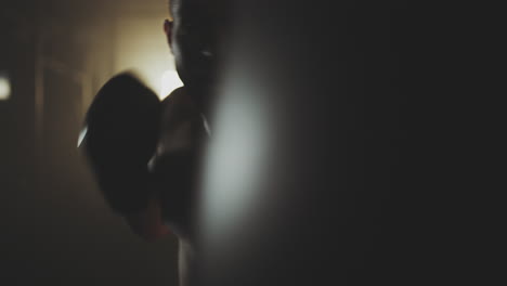 man boxing in gym