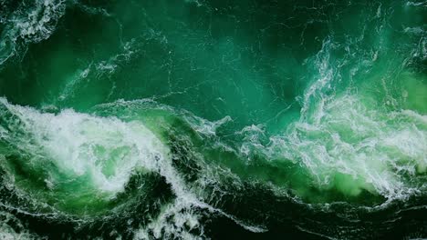 waves of water of the river and the sea meet each other during high tide and low tide.