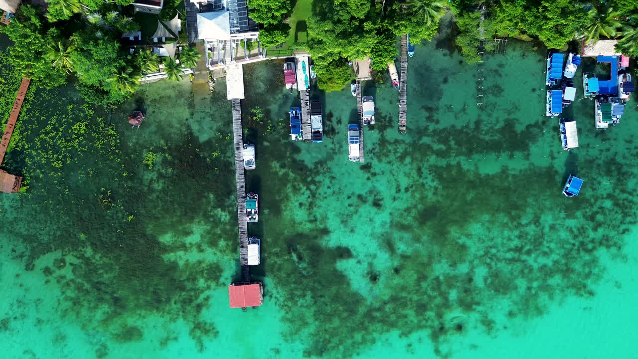 Aerial View of Boats Docked at a Tropical Lagoon