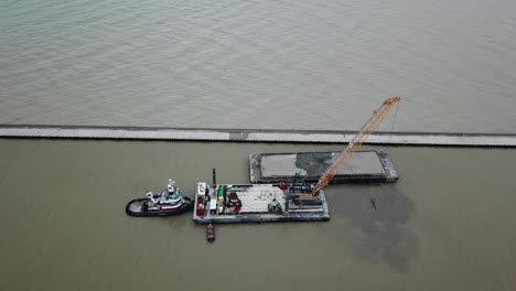 dredging operation in kewaunee harbor on lake michigan, kewaunee, wisconsin-3