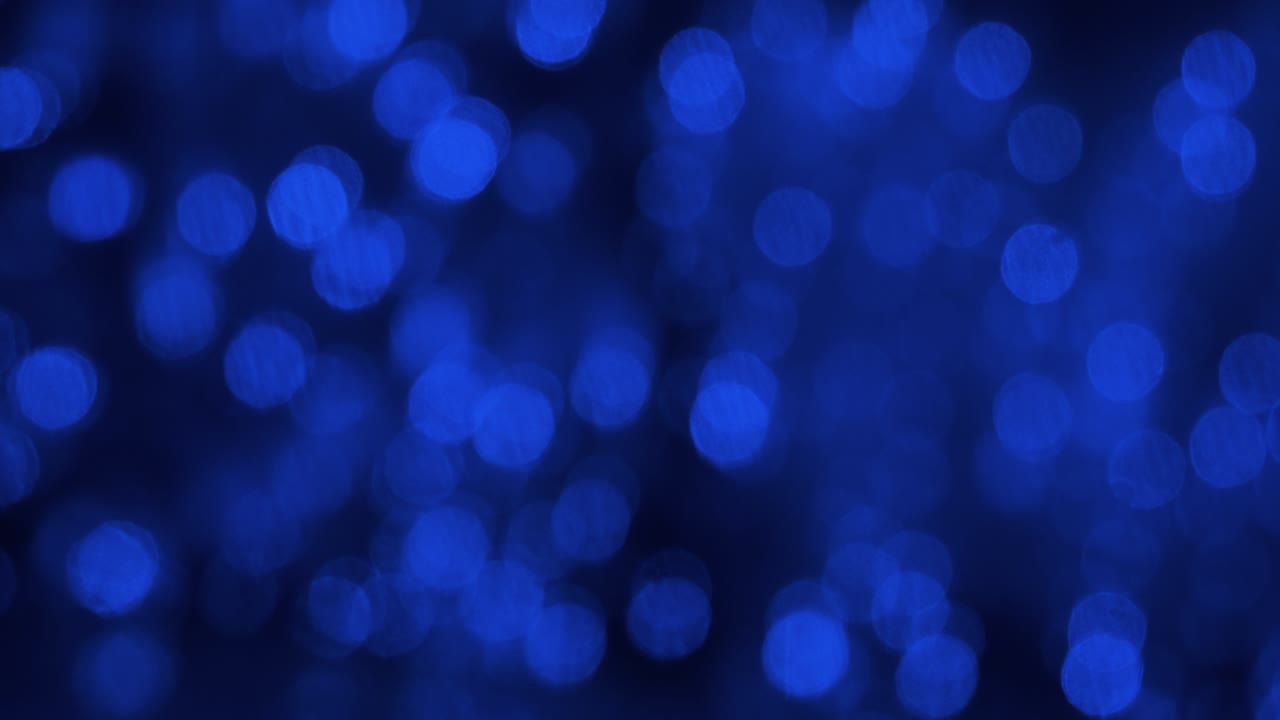 Abstract blur bokeh. Approximation bright blue lights. Abstract background defocused lights.