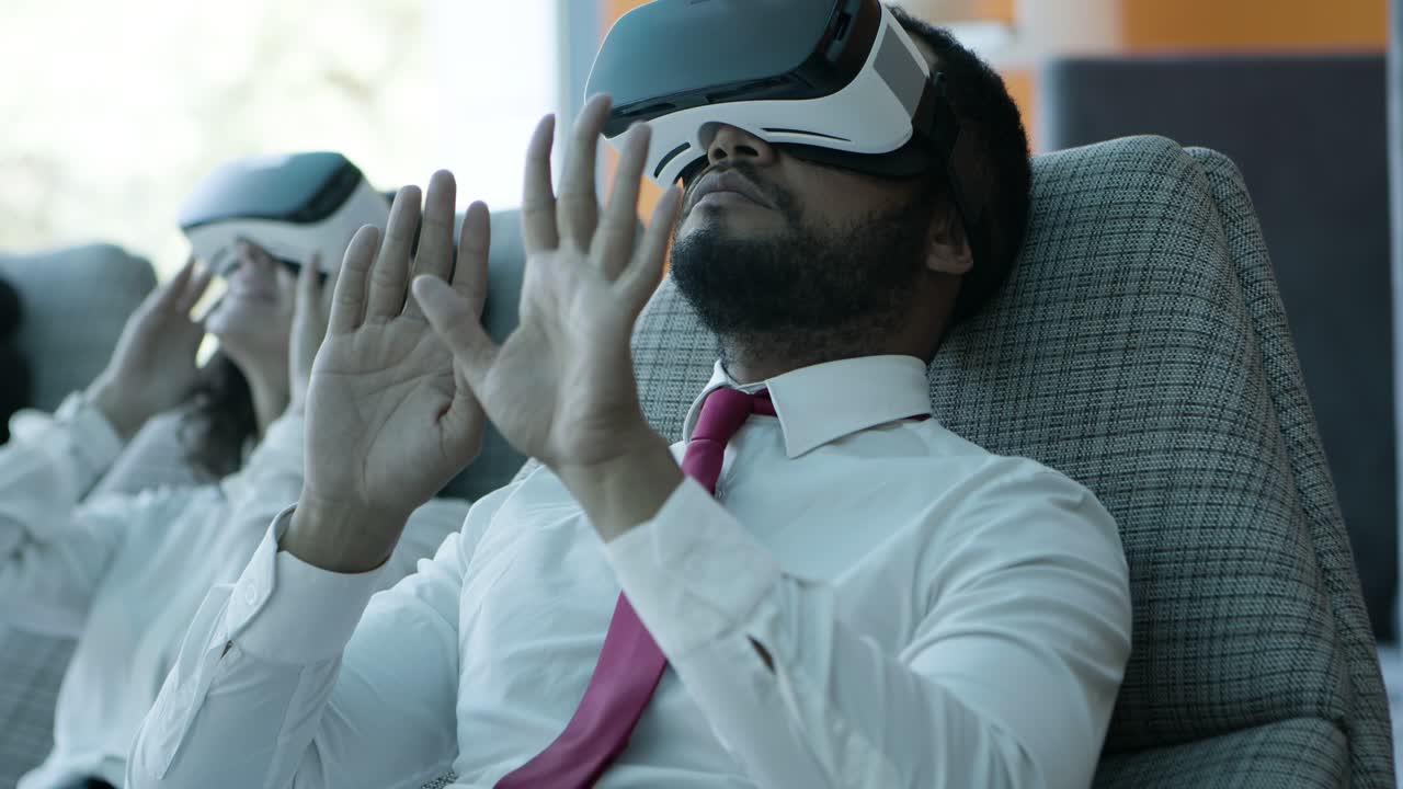 Focused business people in vr headsets