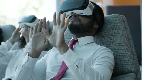 focused business people in vr headsets