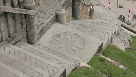 stone stairs with compass rose detail