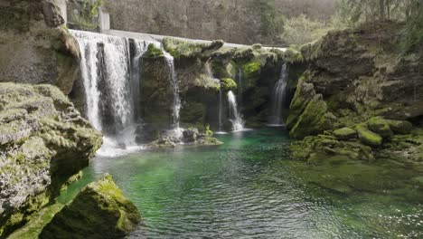 A-smooth-cinematic-shot-approaching-Traunfall-waterfall-in-Austria-slowly