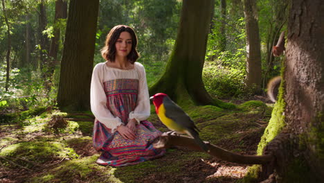 woman interacting with forest animals in an enchanted woodland