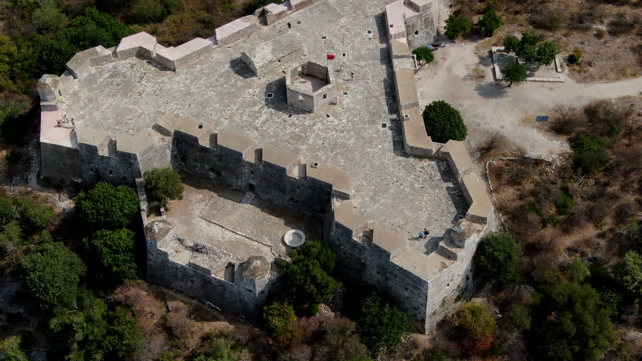 Aerial shot over the castle of Porto Palermo in Albania and on a sunny day