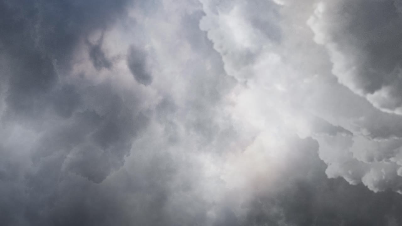 4k view of clouds above the sky with lightning striking