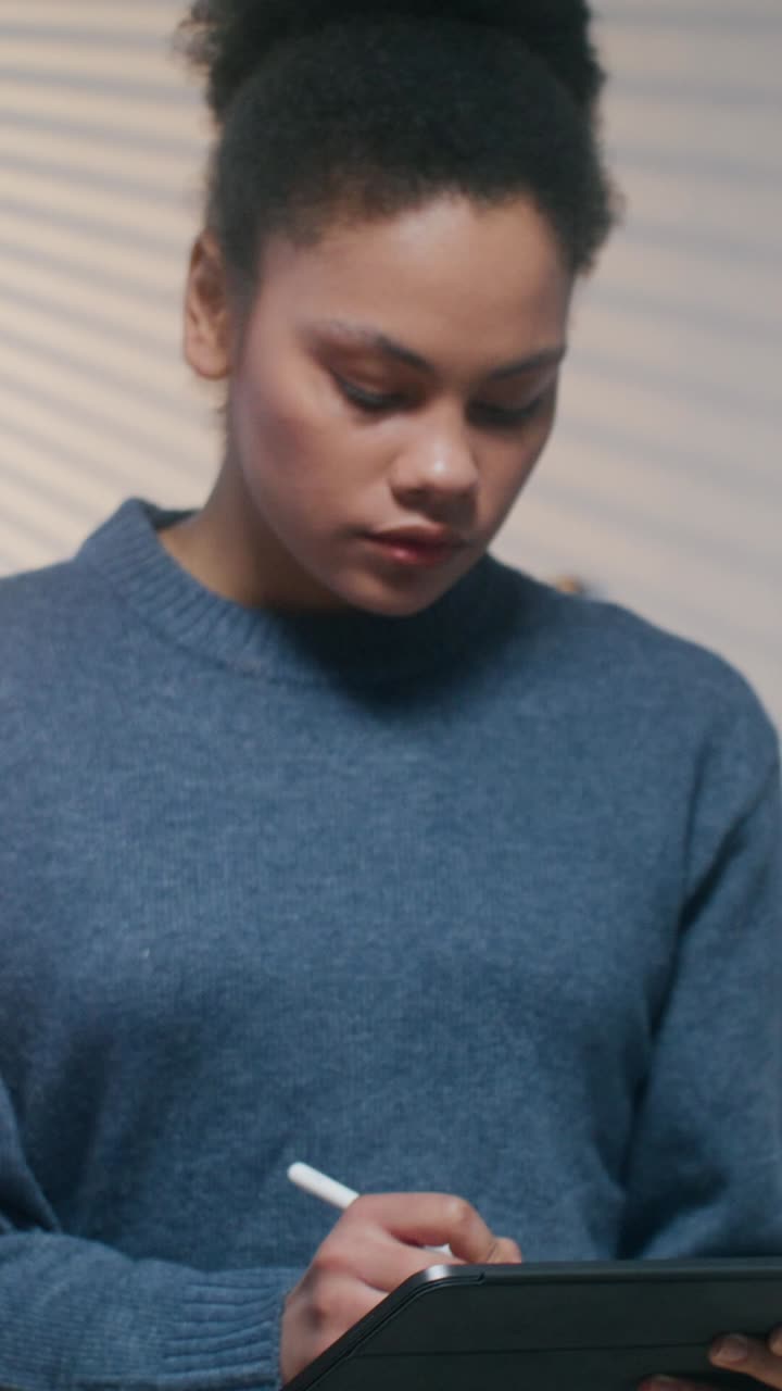 Two people collaborating on digital art project