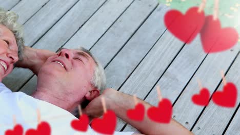 mature couple lying on floor together