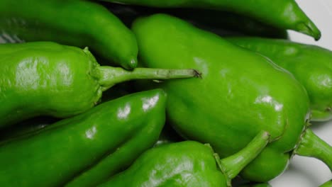 green anaheim peppers, closeup pan right from above