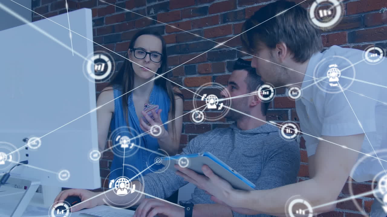 Collaborating on digital devices, young professionals with animation overlay in office