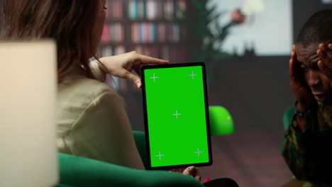 business meeting with green screen tablet