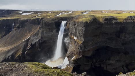 Large-Canyon-With-Waterfall