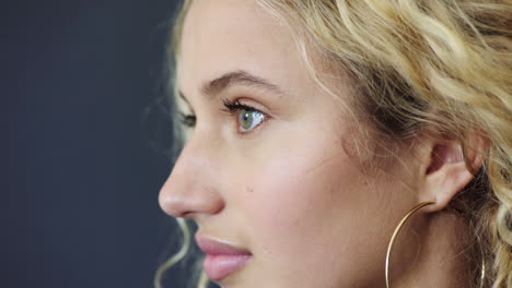 beauty, eyes and face of a woman in a studio