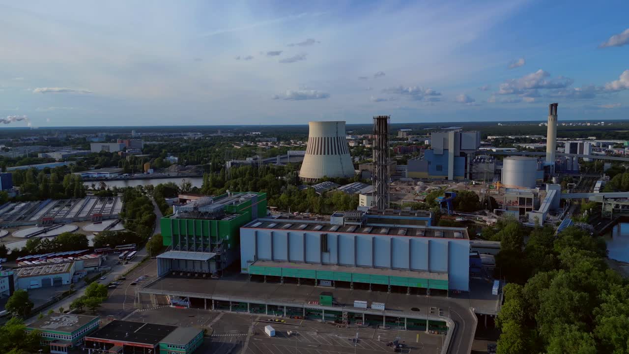Waste incineration plant, waste to new energy sources, polluting the atmosphere and contributing to climate change. Gorgeous aerial view flight overflight flyover drone