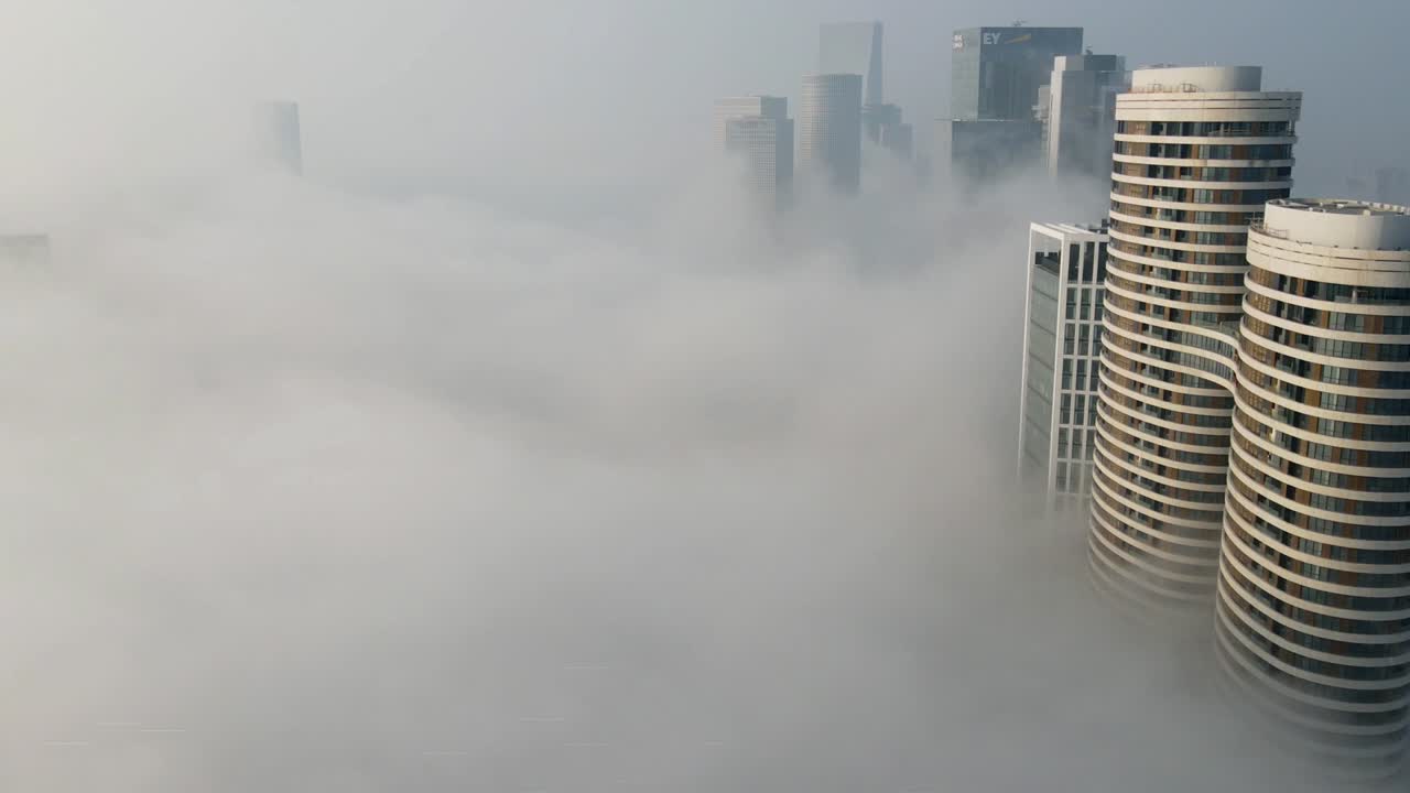 City Skyline Through Fog