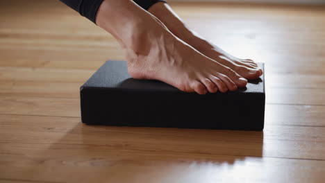 yoga stretching with block