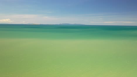 slow tropical sea drone overflight