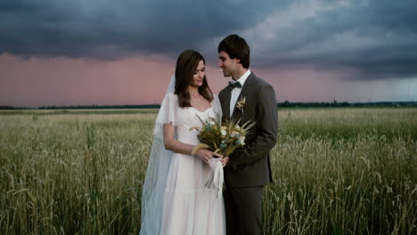 young couple in love in a fall field