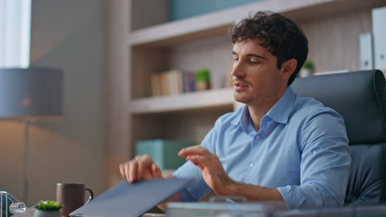 Proud manager finishing project closing laptop. Closeup freelancer thinking