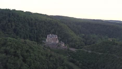 eltz castle or burg eltz in germany surrounded by woods