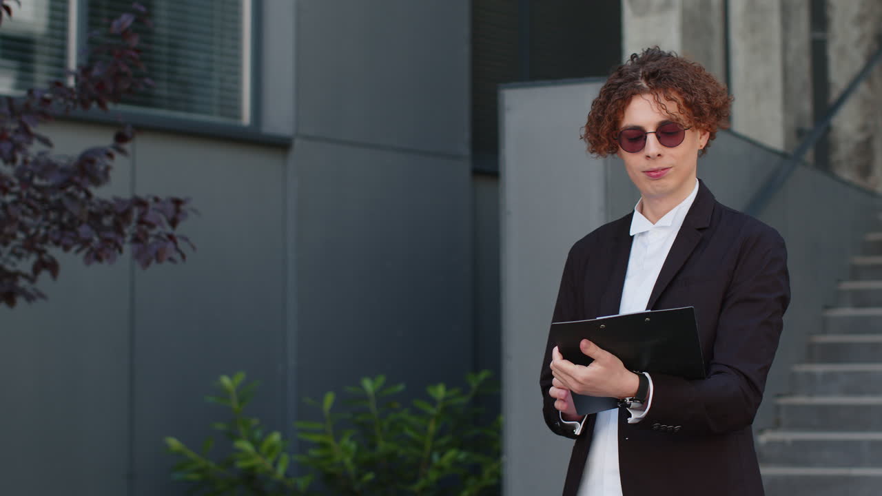 Happy businessman work with documents reading information business papers prepare financial report