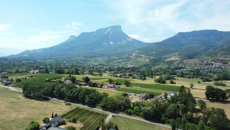 aerial view of a french valley with mountains and vineyards