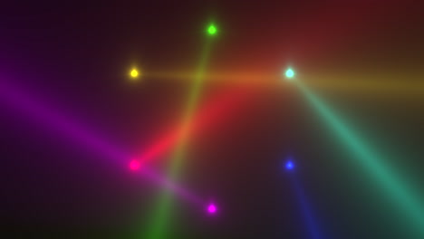 Animation-motion-colorful-glowing-spotlight-beams-on-dark-background-in-stage