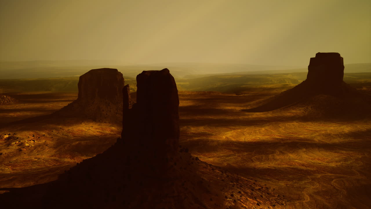 Mesmerizing landscape of towering rock formations at sunset in a desert expanse