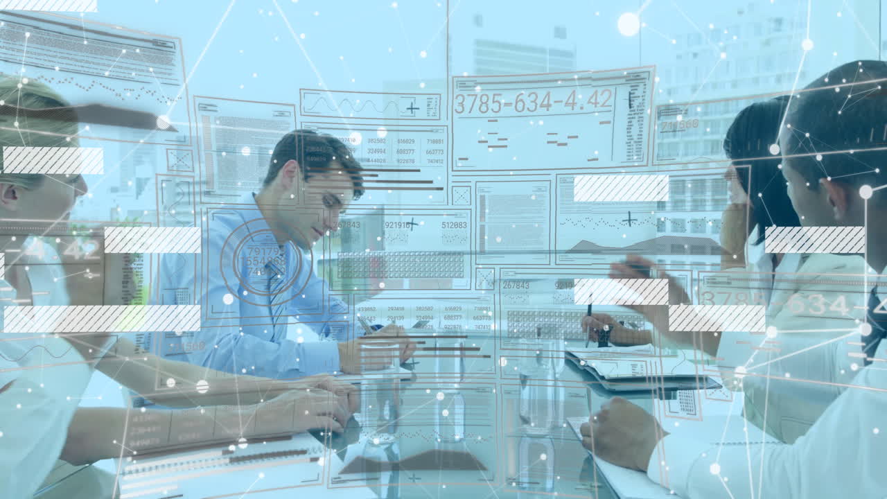 Diverse professionals in business meeting analyzing digital data and graphs in office