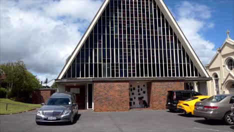 Shot-of-hearse-arriving-or-leaving-a-funeral