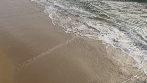 Soft-sea-waves-on-the-portugese-shore-in-the-coast-of-Portugal