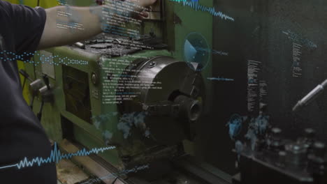 male technician adjusting lathe controls in workshop, overlaying holographic code, world-map icons