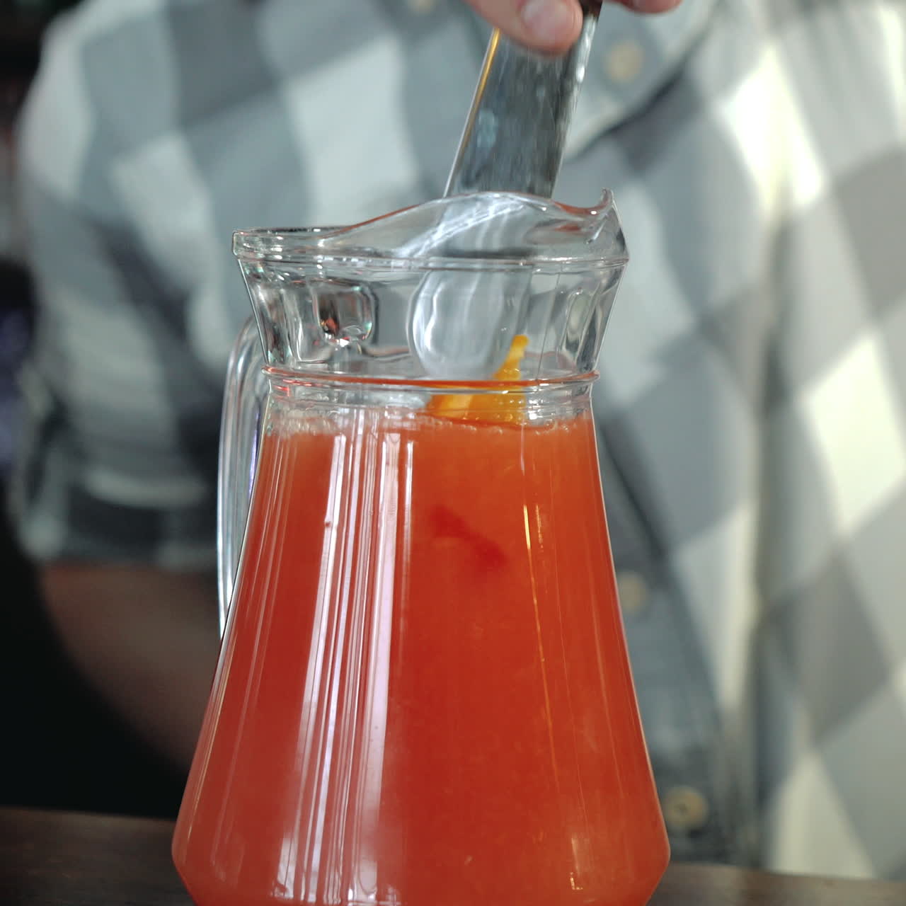 Bartender makes a refreshing lemonade. Cooking fresh juice Sqare video