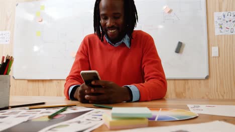 male business executive using mobile phone