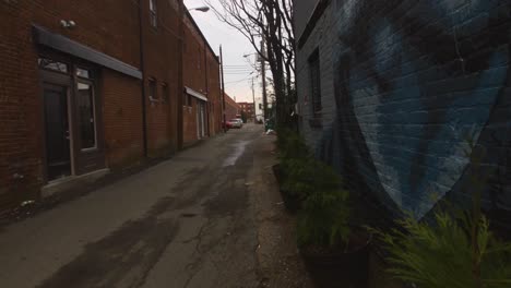 dirty city alleyway pan