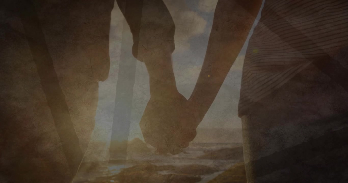 Sun sinking sparking couple tightening grip on coastal travel with animated flare haloing hands