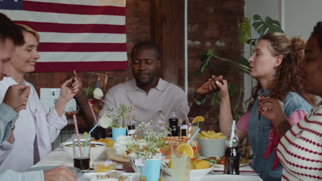 friends celebrating a holiday dinner