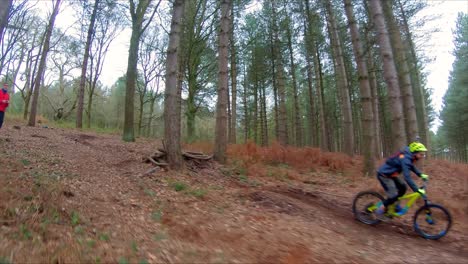 cable cam following a mountain bike down a trail at cannock chase