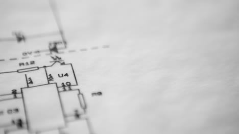 Dolly-shot-of-an-electrical-circuit-drawing