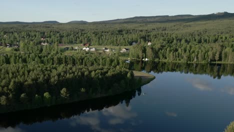 A-small-white-airplane-taking-off-over-a-river-on-a-sunny-summer-day