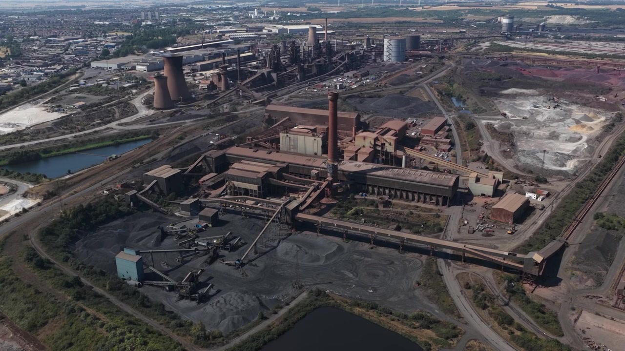Aerial view of Scunthorpe Steelworks in North Lincolnshire, showing blast furnaces, heavy industry and large-scale primary steel production.