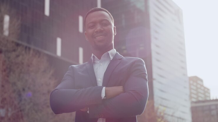 Confident, proud and happy entrepreneur standing