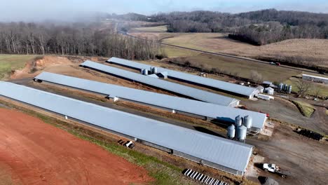 aerial slow push over chicken farm in wilkes county nc, north carolina
