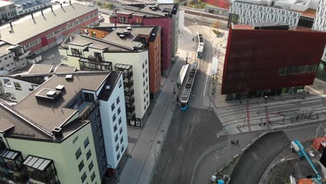 modern buildings of gothenburg old town and tramway transport, aerial drone view