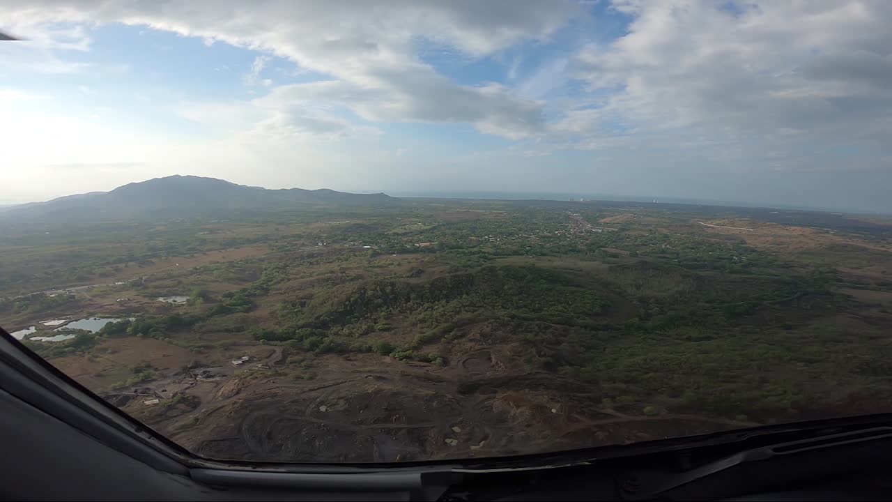 Helicopter flying over the mountains on board